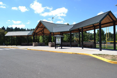 Shelter with benches and park map at entrance to sports fields – off main parking lot